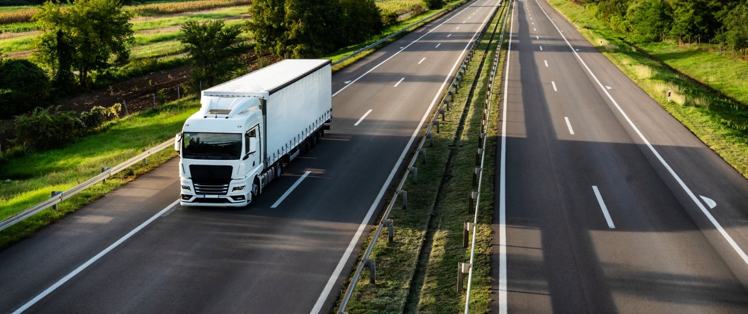 In che modo Neele-Vat serve il settore edile con i trasporti verso il Belgio?